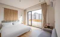 Floral Hotel·Mudaodao hotel (Grape Beach Bathing Beach Maotoushan Branch) - พร้อมระเบียง
