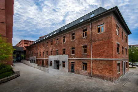 Taoyi Red Mud Hotel (Taoxichuan Cultural and Creative Block Store) Отели в г. Цзиндечжэнь