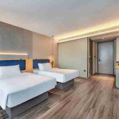 ホームイン ビジネスホテル(自貢富順時代広場職業技術学校) Rooms