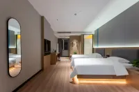 Elong R.YUN Hotel (Ordos Yinyue Penquan Guangchang) Hotels near Ordos College of Inner Mongolia University Stadium