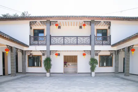 Xin'an Chinese Inn Homestay Отели рядом с достопримечательностью «Miaodao Mountain»