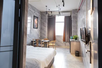 Jiuli Apartment Hotel (Jinli New Times Square) Отели рядом с достопримечательностью «Площадь Нового Таймса Кингли»