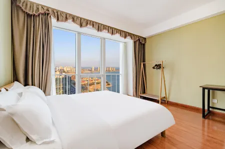 Qingdao Lixia Scenic Apartment (Jinshatan Tangdao Bay) Отели рядом с достопримечательностью «Xihai Art Gallery»