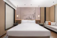 Wanda Moments Hot Spring Hotel (Tourism Service Center of West Changbai Mountain) Hotel in zona Donggang Meeting Site