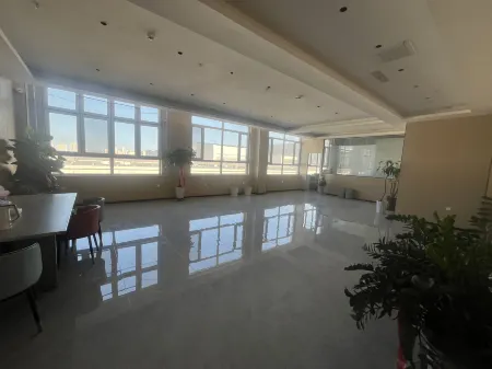 Herui Hotel Отели рядом с достопримечательностью «Shihezi Vocational and Technical College (New Campus)»