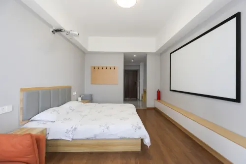 First sight intelligent film and television apartment (Linyi University Town Golf manor store) - วิว