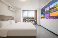 西柚假日民宿（三橋萬象城店） 鄰近漢唐體育運動中心的酒店