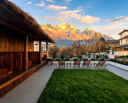 Beyond the Clouds · Golden Sunrise | Snow Mountain & Lake View Secret Garden Hote Hotels in Lijiang