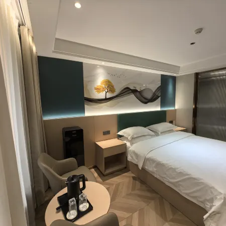 Xingping Juhao Grand Hotel Отели в г. Синпин
