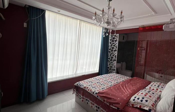 Tieling July Theme Hotel