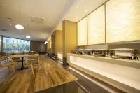 Zoucheng Mehood Hotel (Yishan North Road Sports Park) - فطور