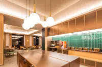 Orange Hotel (Xinyang Gushi Branch) - พร้อมอาหารเช้า