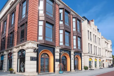 Ningbo Bund Puna Art Hotel Отели рядом с достопримечательностью «Ningbo University of Technology (East Campus)»