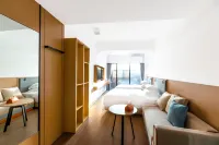 Shangpin rongxi Apartment (Plaza Gaoqi Airport Branch) - Inns