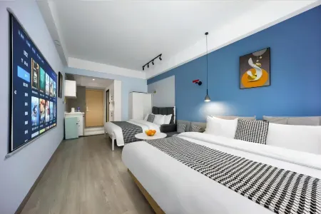 Yihang Holiday Hotel Отели рядом с достопримечательностью «Qiongtai Normal University (Guilinyang Campus)»