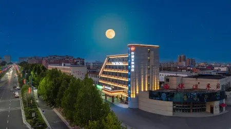 Qianna Baihe Hotel (Xihua No.2 High School Bus Station Branch) Отели рядом с достопримечательностью «Jizi Reading Platform»