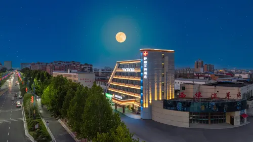 Qianna Baihe Hotel (Xihua No.2 High School Bus Station Branch) Hotels in Xihua