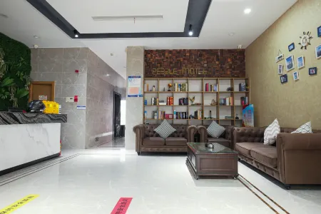 Tongda Smart Serviced Apartment Отели в г. Шэнчжоу