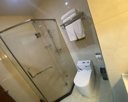 Hua Sheng Hotel Rooms Photos