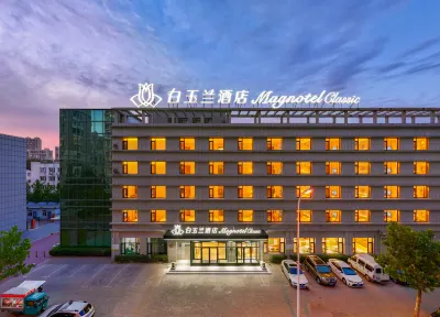 Magnolia Business Hotel ( Dalian Jinzhou Hengda Garden） Отели в г. Ж/д вокзал Jinzhou / стадион