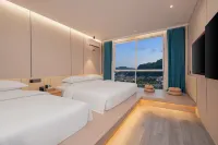 Xuan En Qingxin Yayuan Hotel (Wetland Park Store) Hotels near Double Dragon Lake