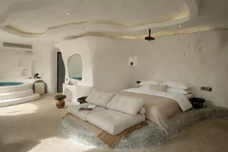 Jadeer · Jinghong Collection ｜Baitinai Rainforest Secret Villa Отели рядом с достопримечательностью «Menghanman Tingfota Temple»