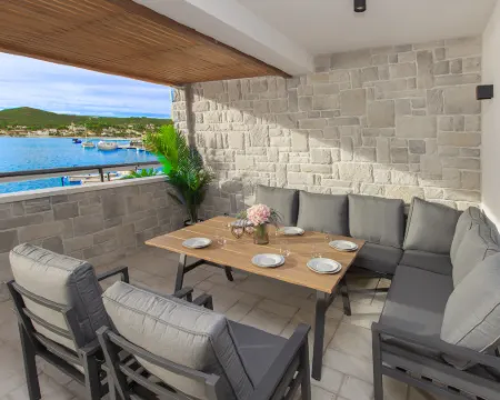 Seafront villa Kupinica with private indoor Pool Hotels in Vinisce