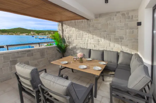 Seafront villa Kupinica with private indoor Pool