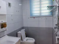 Qingfeng Homestay (Wenchang Road) - شرفة
