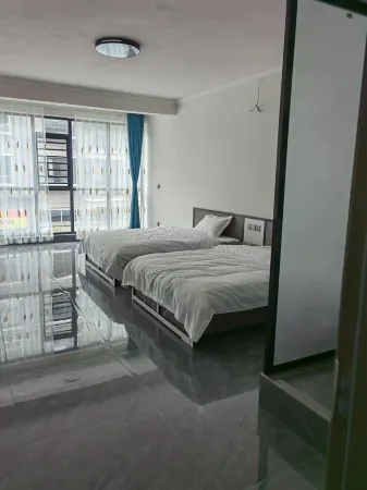 Fenggang Banshan Apartment Отели рядом с достопримечательностью «JinGangCheng ShangYe BuXingJie»