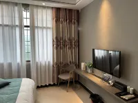 Xijiang Chaoyang Vacation Apartment (Qianhu Miao Village West Gate Tourist Service Center) - Inns