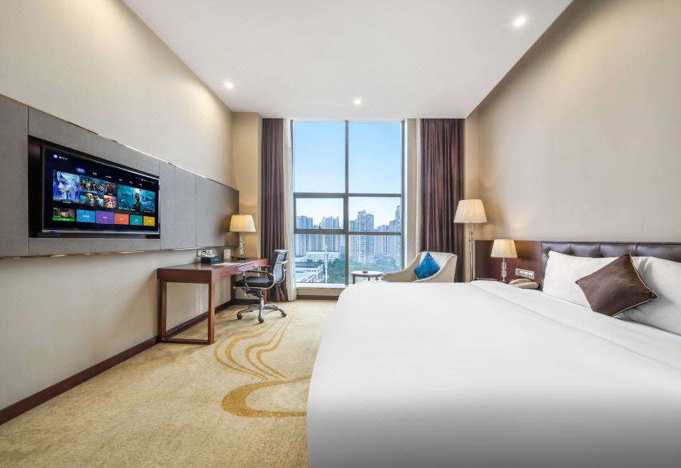 홍러우 인싱 호텔（충칭 서역）의 여유로운 분위기의 객실 사진