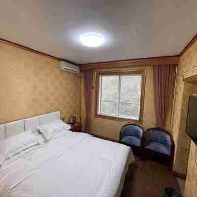 Heishui Kangle Garden Hotel Rooms