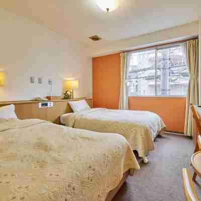 熊谷ロイヤルホテルすずき Rooms