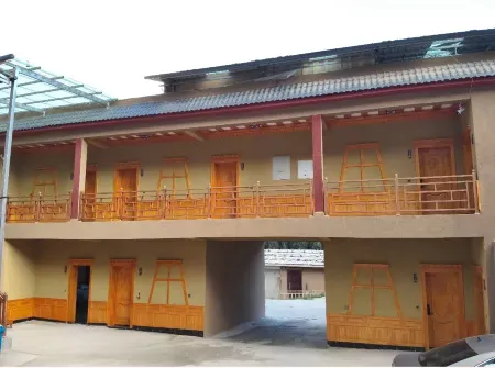 Zhagana Pure Land Homestay Отели в г. Диебу