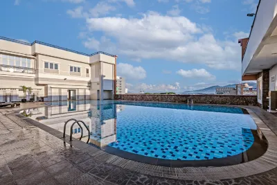 Grand Whiz Megamas Manado Hotels in Sario