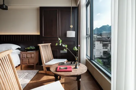 Xingyue Private Hot Spring Homestay (Libo Xiaoqikong Scenic Area East Gate) Отели рядом с достопримечательностью «Laya Waterfall»