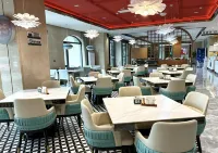 Fuji International Hotel (Huannan County Huaxi Lake Park Store）) - فطور