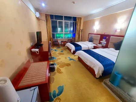 Huyang Business Hotel Отели рядом со станцией Ruoqiang Railway Station