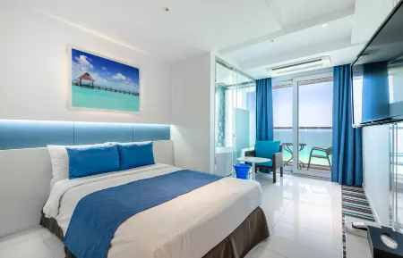 Aimi Jeju Beach Hotel Hamdeok Отели рядом с достопримечательностью «Dangcheomuldonggul Cave»