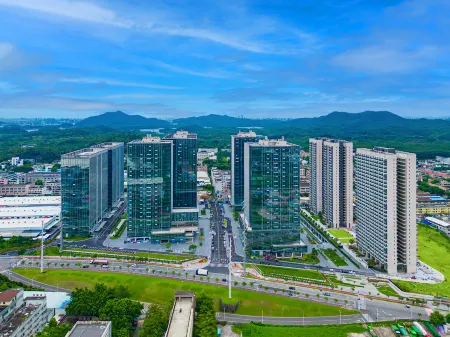 Dongguan Shiguang Cloud International Apartment Отели рядом с достопримечательностью «Guangdong University of Science & Technology»