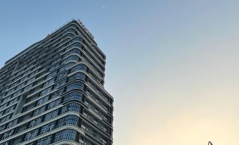 Yijia Apartment (Jiangmen East Station Jianghai Wanda)