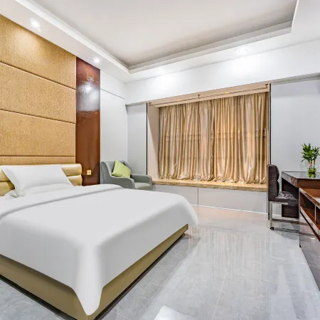 Zhenxiangjia Serviced Apartment Отели рядом с достопримечательностью «Guangzhou Flying Over the Jungle Adventure Park»