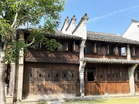 Yanguan Chaolezhicheng Baoren Apartment Отели рядом с достопримечательностью «Xiaoputuochan Temple»