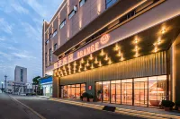 Orange Hotel in Hongqiao, Yueqing, Wenzhou. Отели рядом с достопримечательностью «Станция Вонг-Шио Юань»