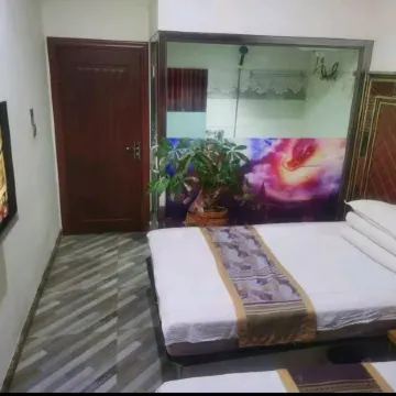 Harbin Caotangjian Central Chinese Inn Отели рядом с достопримечательностью «Китайская медицинская больница, Хулань, Харбин»