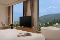 麗江逸境伴山設計師美宿（麗江三義國際機場店）