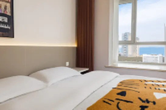 Zhouya Seaview Audio-Visual Vacation Homestay (Huoju 8th Street International Coastal Baths)