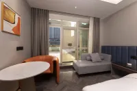 Ibis Styles Hotel (Liyang Babaiban Shanghecheng) - balcón
