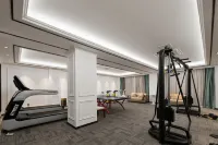 Meizhu Meishu Hotel (Xinyang Huaibin People's Government Branch) - Gym